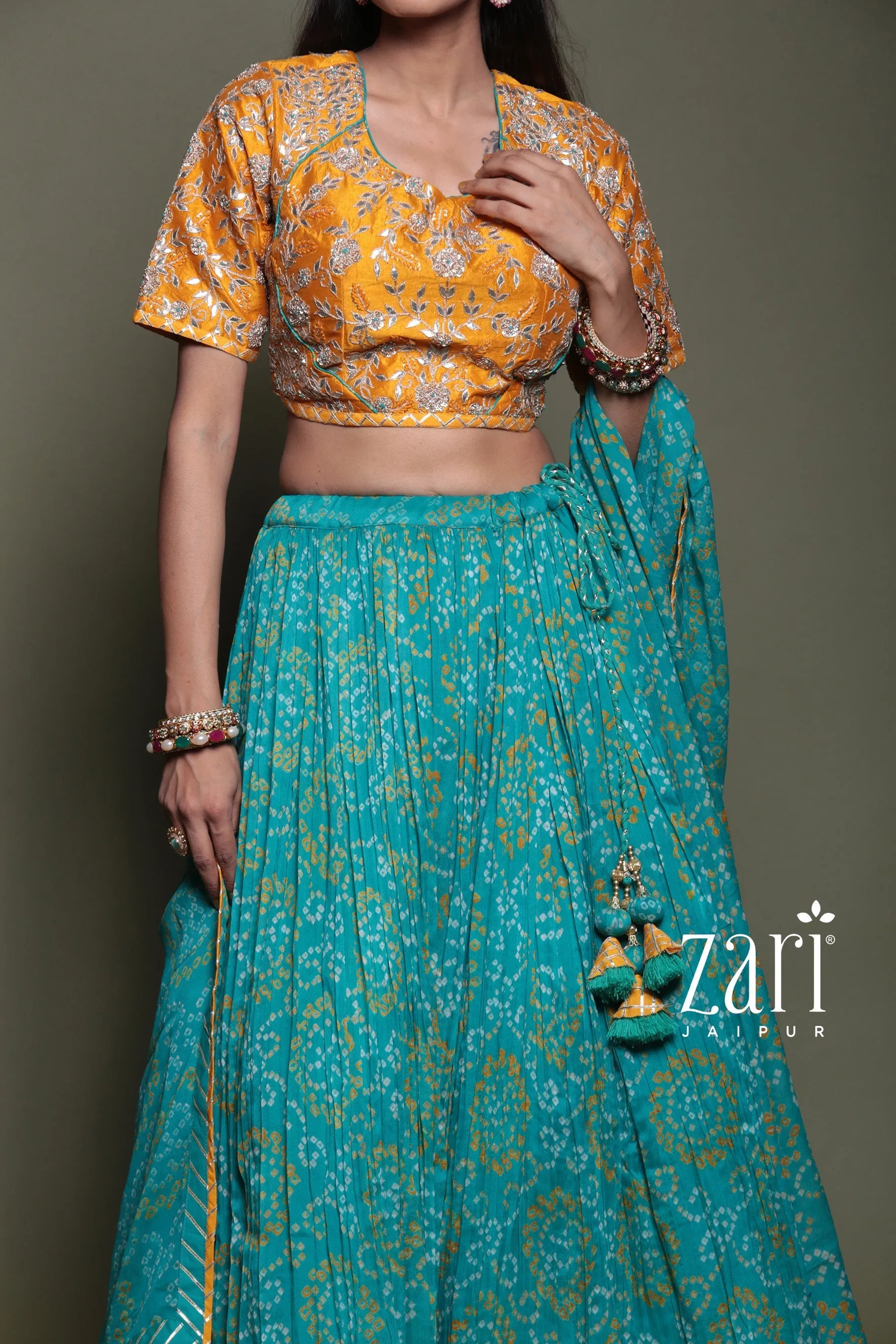 Bandhej Chinon silk Lehenga with Aari, Gota Patti, Sequins, Thread, Zardozi work.